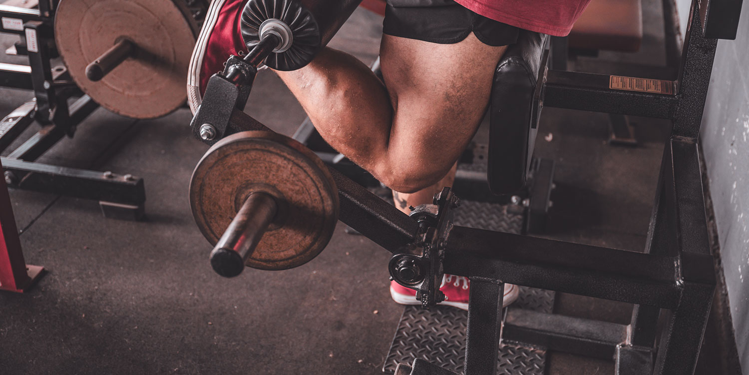 Lever Plate Loaded Standing Single Leg Curl