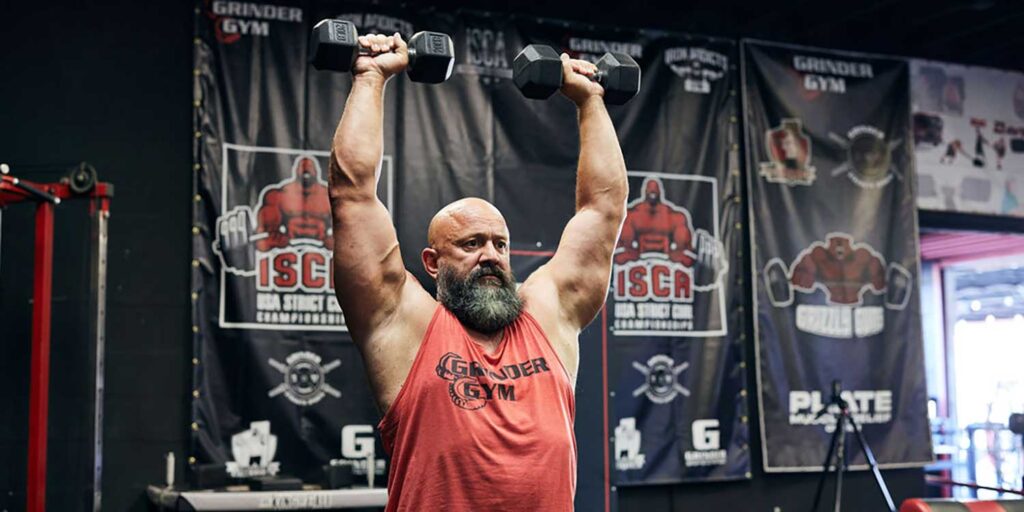 Dumbbell Standing Arnold Press Dave 0210 1024x512