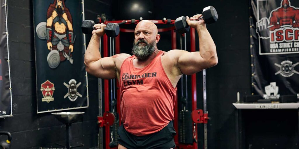 Dumbbell Standing Overhead Shoulder Press Dave 0211 1024x512